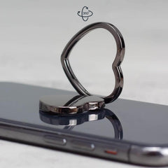 Soporte metálico giratorio de 360 grados para teléfono con hebilla de anillo.