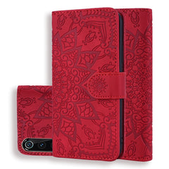 Estuche de cuero en relieve con diseño plega...
