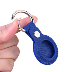 Estuche de cuero con textura Litchi con anillo para AirTag