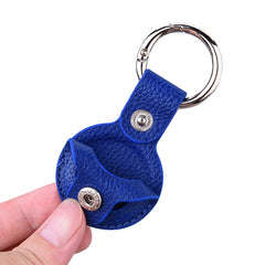 Estuche de cuero con textura Litchi con anillo para AirTag
