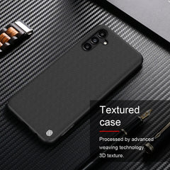 NILLKIN 3D Textura Nylon Fibra PC + TPU Caja...