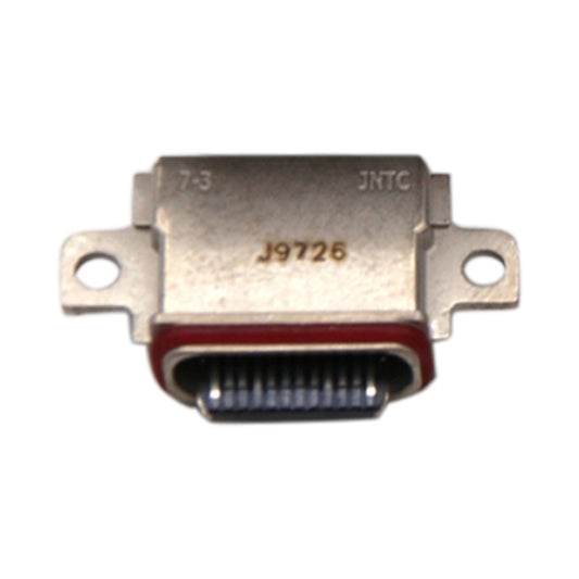 Conector del puerto de carga                ...
