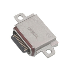 Conector del puerto de carga                ...