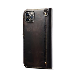 Estuche de cuero genuino con botón magnético...