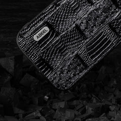 Funda para teléfono con borde negro y patrón...