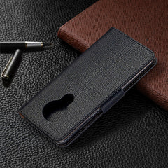 Estuche de cuero con tapa horizontal de colo...