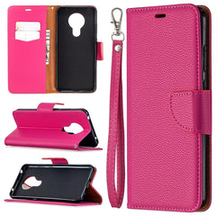 Estuche de cuero con tapa horizontal de colo...