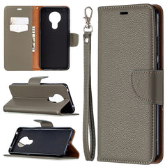 Estuche de cuero con tapa horizontal de colo...