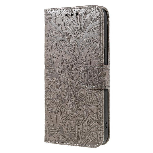Funda de cuero tipo libro con relieve de flo...