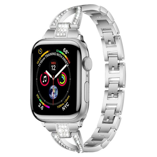 Correa de reloj de metal con diamantes de un...