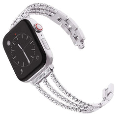 Correa de reloj metálica con tres diamantes ...