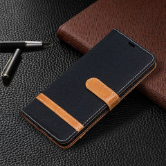Estuche de cuero con textura de mezclilla a ...