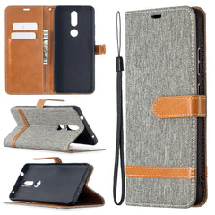 Estuche de cuero con textura de mezclilla a ...