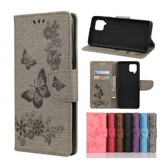Estuche de cuero con tapa horizontal con est...