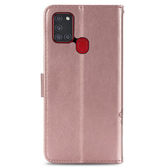 Estuche de cuero con patrón de flores prensa...