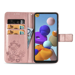 Estuche de cuero con patrón de flores prensa...