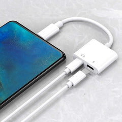 Audio y carga auxiliares con conector Lightning dual para iPhone 2 en 1