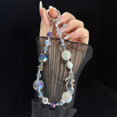 Elegante cadena de perlas y cristales con detalle de lazo de aleación dorada