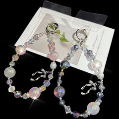 Elegante cadena de perlas y cristales con detalle de lazo de aleación dorada