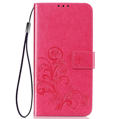 Estuche de cuero con patrón de flores prensa...