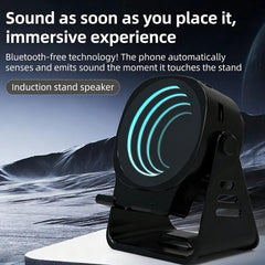 Altavoz inalámbrico por inducción con soporte para teléfono