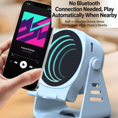 Altavoz inalámbrico por inducción con soporte para teléfono